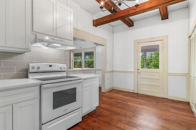 kitchen featuring dark hardwood / wood-style floors, a healthy amount of sunlight, white range with electric stovetop, and white cabinets