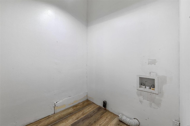 laundry room with hookup for a washing machine and hardwood / wood-style floors