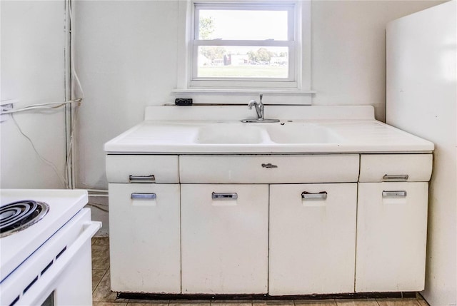 bathroom featuring vanity and tile patterned floors