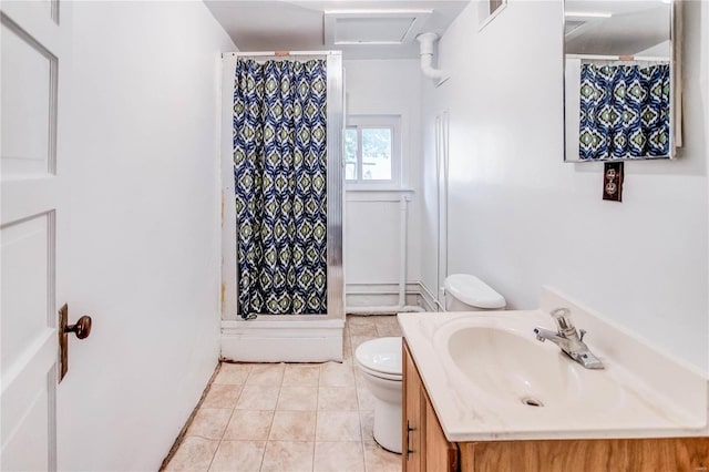 bathroom featuring vanity, a shower with curtain, toilet, and tile patterned flooring