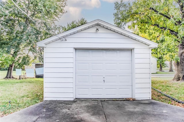 garage with a lawn