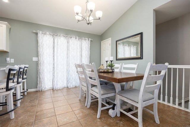 tiled dining area featuring vaulted ceiling and an inviting chandelier