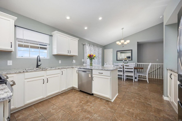 kitchen with lofted ceiling, kitchen peninsula, stainless steel appliances, pendant lighting, and white cabinetry