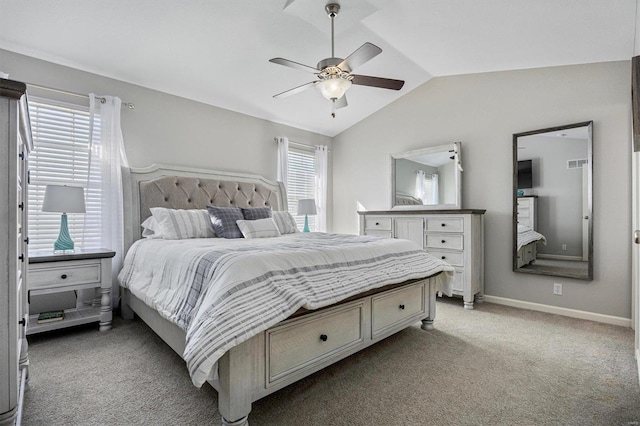 bedroom with ceiling fan, light carpet, and lofted ceiling