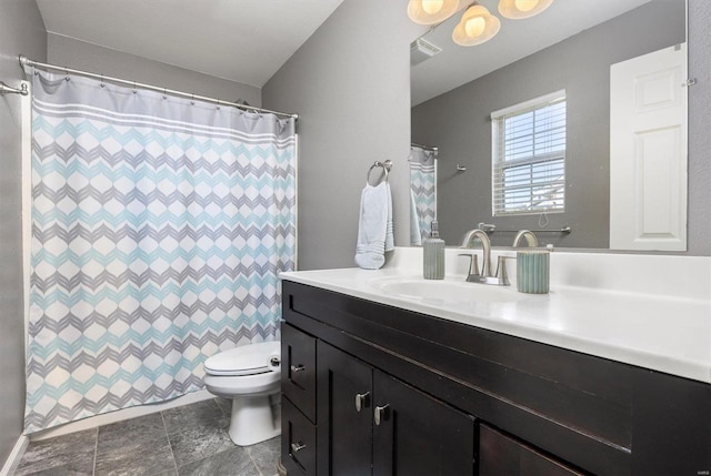 bathroom featuring vanity, a shower with curtain, and toilet