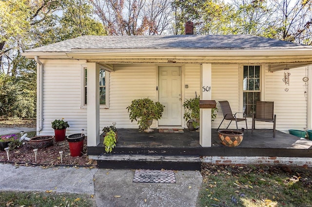 view of outbuilding with a porch