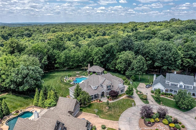 drone / aerial view with a forest view