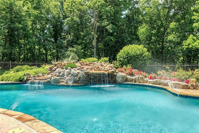 view of pool featuring a fenced in pool and fence