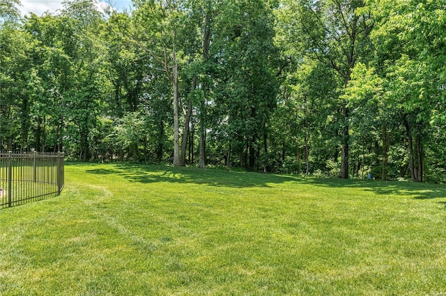 view of yard featuring fence