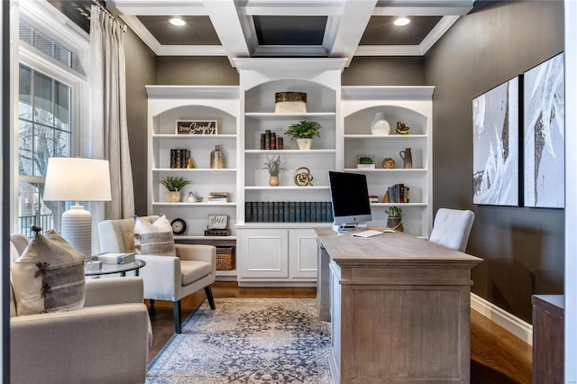 office featuring beam ceiling, wood finished floors, coffered ceiling, and ornamental molding