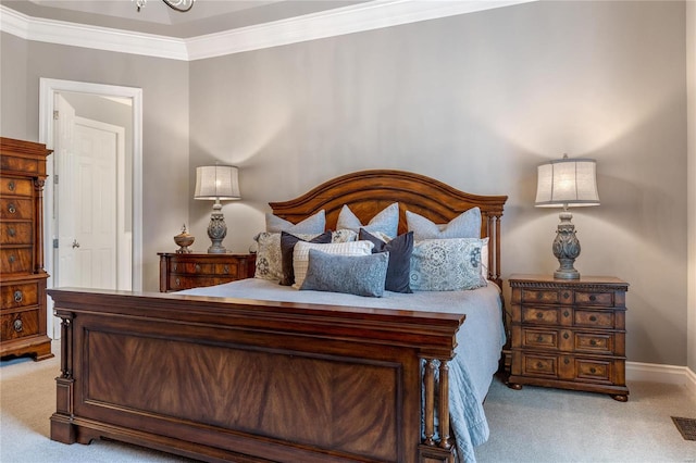 bedroom featuring baseboards, light carpet, and crown molding