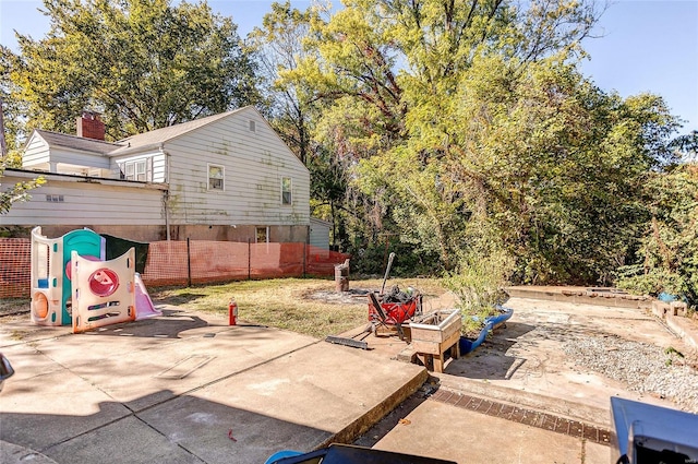 view of patio featuring an outdoor fire pit