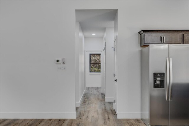 corridor featuring light wood-type flooring