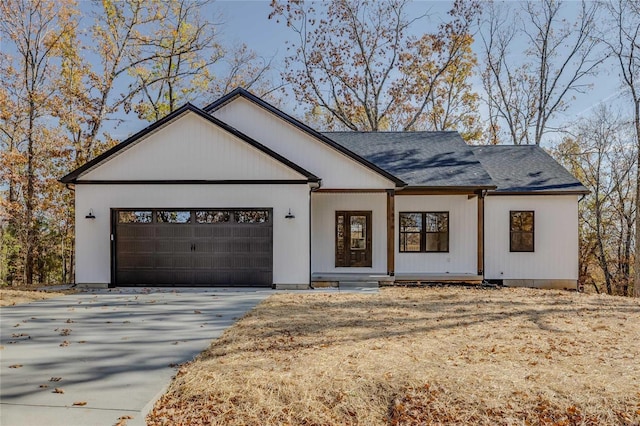 modern inspired farmhouse featuring a garage