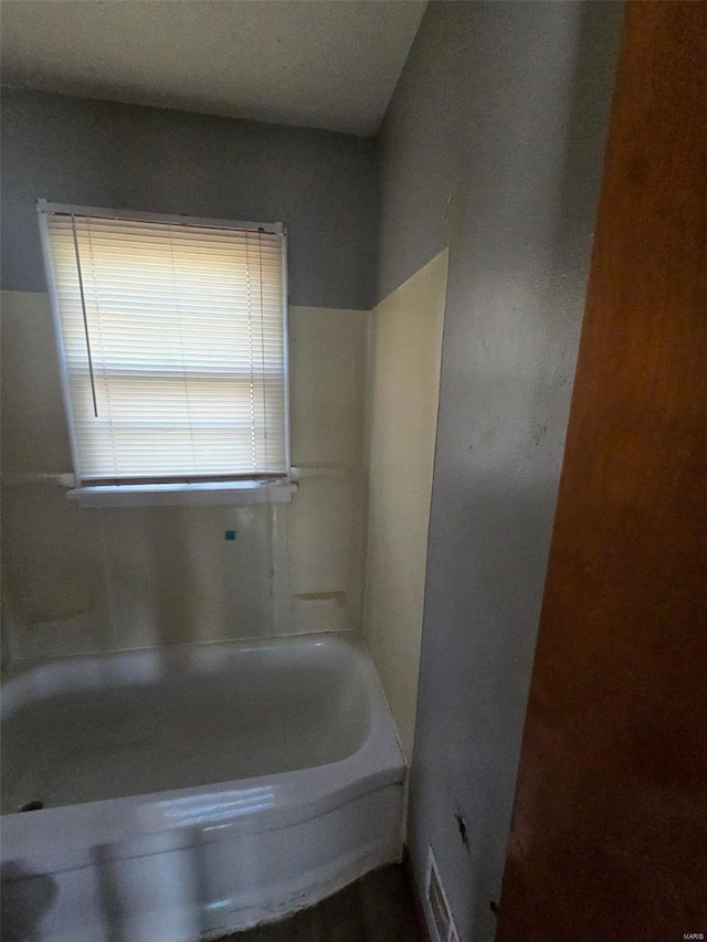 bathroom featuring a bathing tub