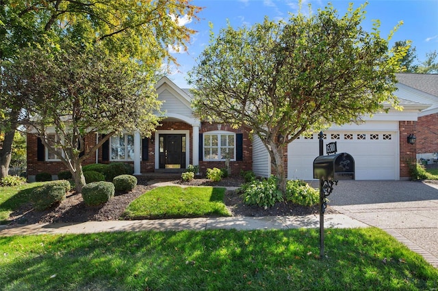 view of property hidden behind natural elements featuring a garage