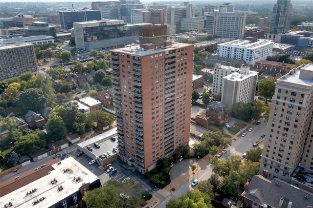 birds eye view of property with a city view