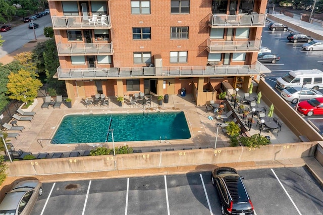 view of swimming pool featuring a patio