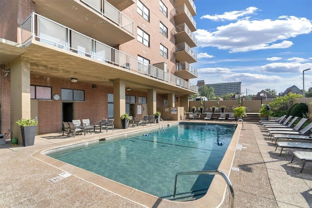 pool featuring a patio area