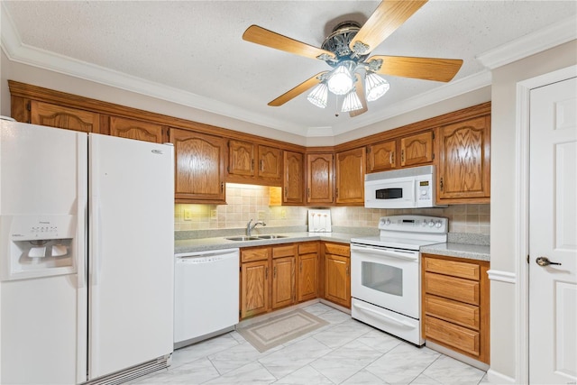 kitchen featuring crown molding, tasteful backsplash, sink, and white appliances