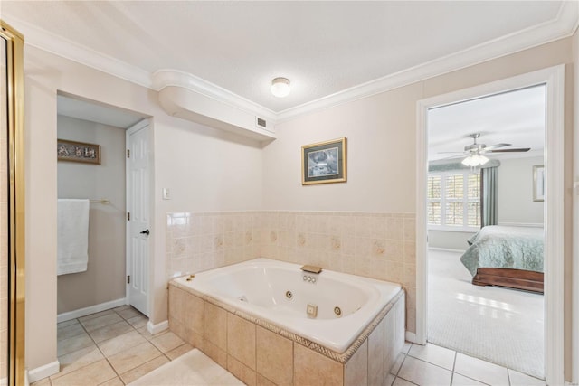 bathroom with crown molding, ceiling fan, tile patterned floors, and tiled bath