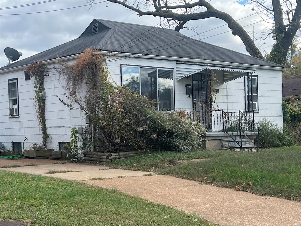 exterior space featuring a front lawn