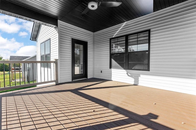 wooden terrace with ceiling fan