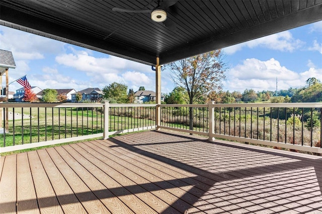 deck featuring a lawn