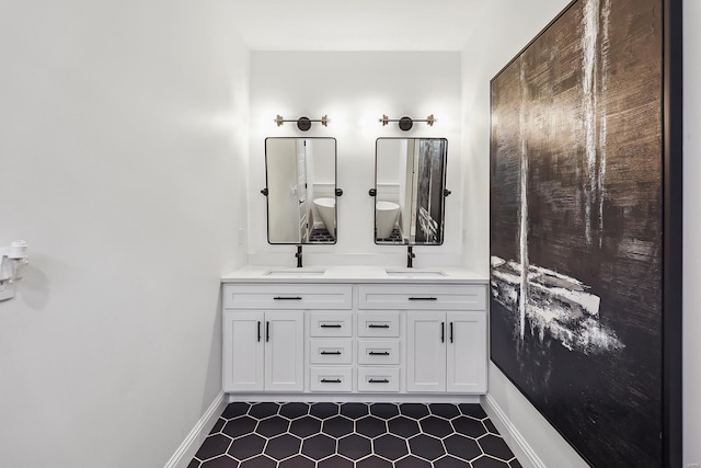 bathroom featuring vanity and tile patterned flooring