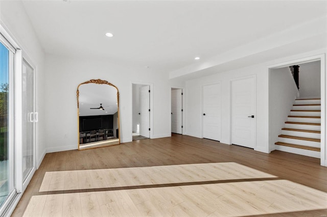 unfurnished living room featuring hardwood / wood-style floors