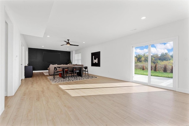 interior space featuring light wood-type flooring and ceiling fan