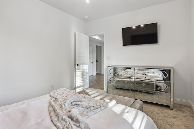 bedroom featuring light hardwood / wood-style flooring