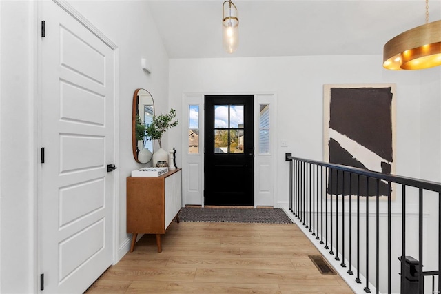 foyer entrance featuring light wood-type flooring