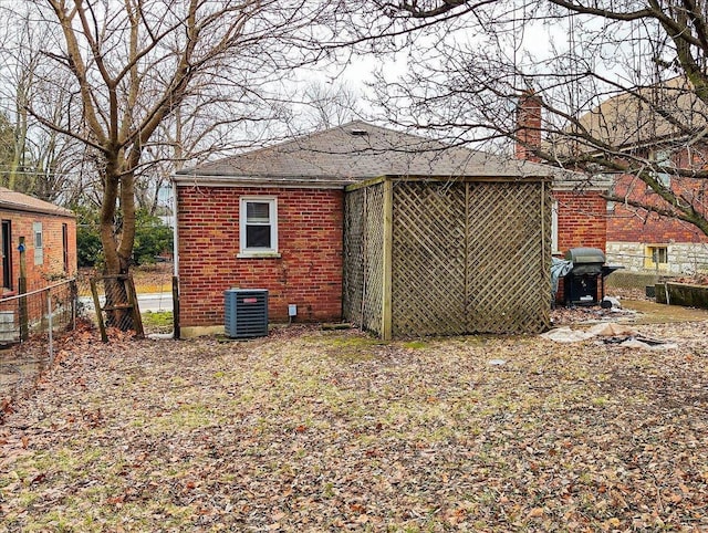 view of outdoor structure featuring central AC