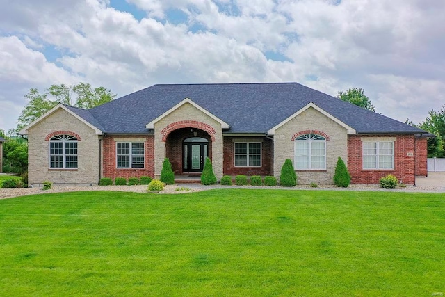 ranch-style home with a front yard