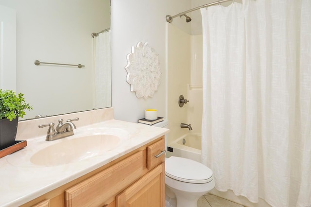 full bathroom with vanity, shower / bath combo with shower curtain, toilet, and tile patterned floors