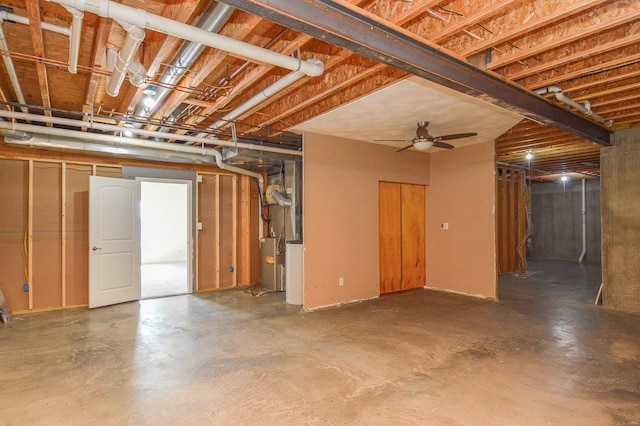 basement with ceiling fan