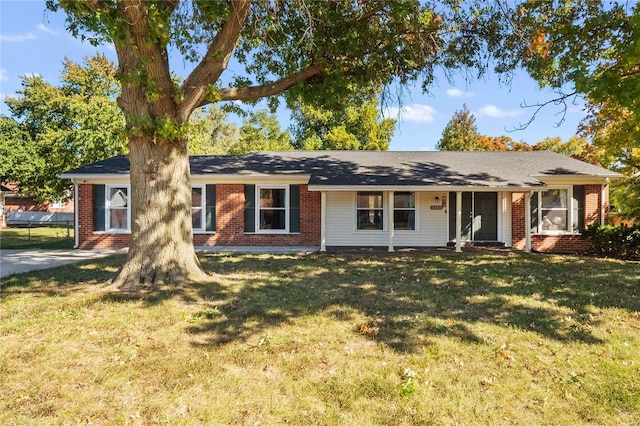 ranch-style home with a front yard