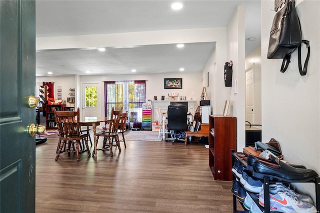 dining area with hardwood / wood-style floors