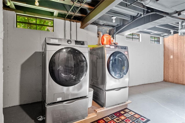 laundry room featuring washing machine and dryer