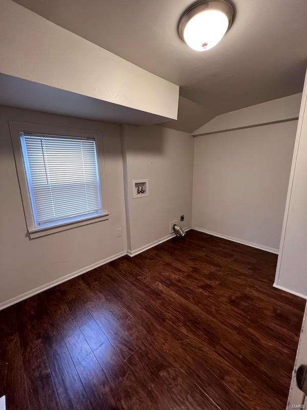 laundry room featuring hookup for a washing machine and dark hardwood / wood-style flooring