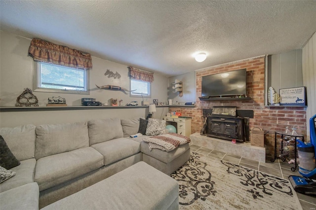 tiled living room featuring a textured ceiling and a wood stove