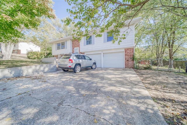 split foyer home featuring a garage