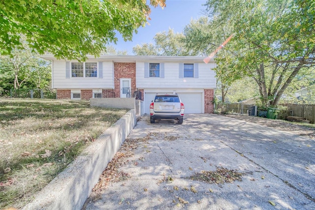 split foyer home featuring a garage