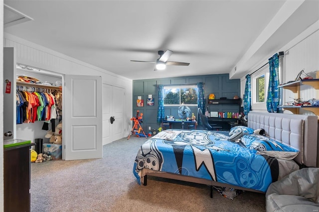 bedroom featuring multiple windows, carpet floors, and ceiling fan