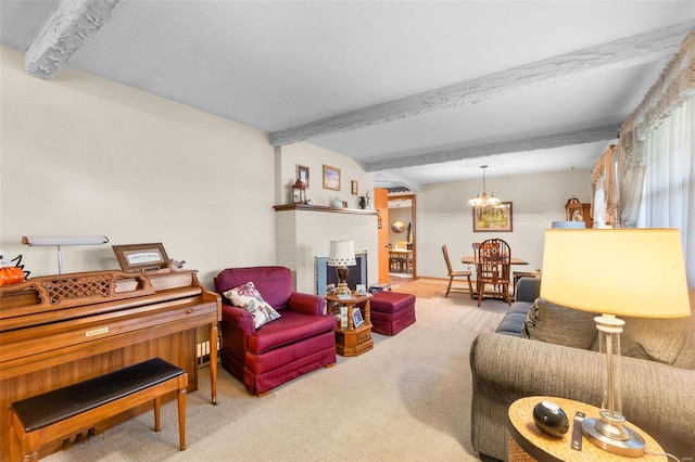 living room featuring beamed ceiling, a chandelier, and carpet flooring