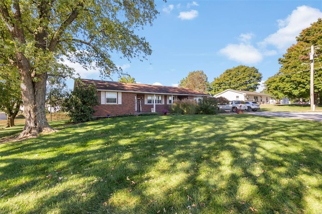 view of front of home with a front lawn