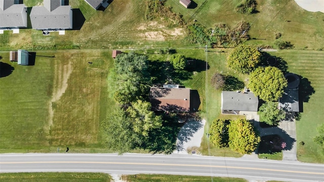 birds eye view of property featuring a rural view