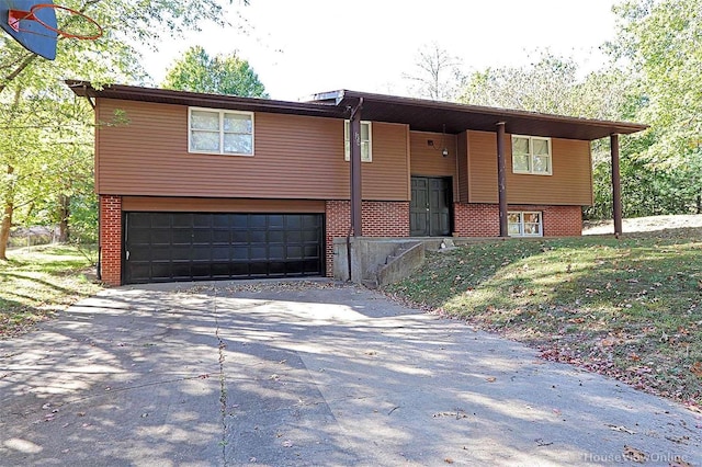 raised ranch featuring a garage