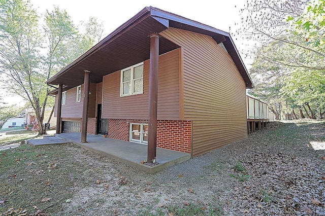 view of home's exterior featuring a patio